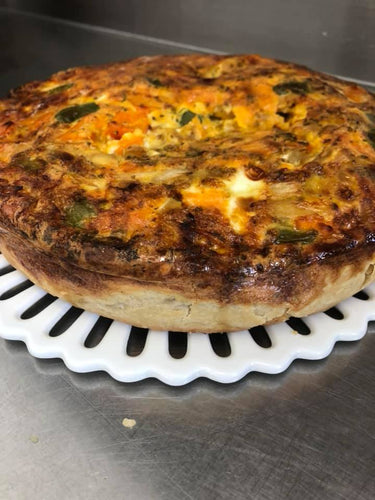 Quiche with crust,  broccoli and cheese