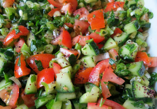Chopped cucumber and tomato salad